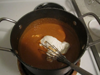 5 quart pot of chicken broth with sour cream